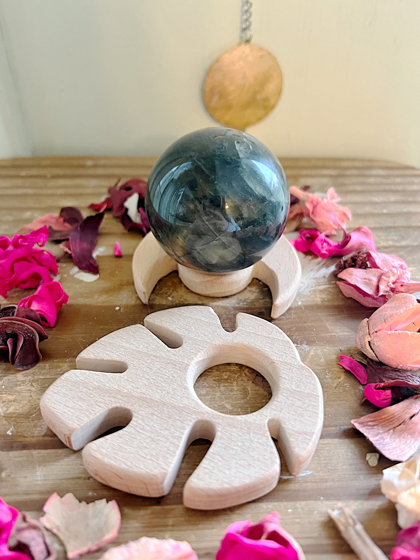 Wooden Sphere Stands in Leaves and Moons